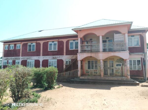 50 ACRES OF LAND WITH A SCHOOL AND HOSPITAL IN KYENJOJO. - Image 6